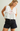 EMBROIDERED SAILOR COLLAR PEPLUM TOP IN WHITE