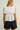 EMBROIDERED SAILOR COLLAR PEPLUM TOP IN WHITE