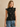 Miou muse mock neck date night top in black. Floral velvet print that is sheer.