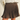 A brown pleated mini skirt with a matching belt and gold buckle, styled with a white ribbed sweater on a model.