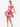 Woman wearing a pink floral dress on a white background