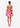 Woman wearing a pink floral dress on a white background