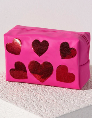 CARA SEQUIN HEART POUCH IN PINK