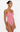 Woman wearing a red and white striped swimsuit on a white background