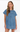 A woman modeling a light blue denim mini dress with short sleeves, a gathered neckline, and raw hems, set against a plain white studio background.