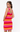 Woman wearing a colorful striped dress on a white background