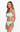 Woman wearing a light blue bikini set on a white background