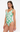 Woman wearing a green and white patterned swimsuit on a white background