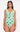 Woman wearing a green and pink patterned swimsuit on a white background