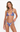 Woman wearing a colorful bikini set on a white background
