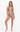 Woman wearing a colorful bikini set on a white background
