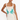 Woman wearing a white dress with palm tree and shell designs on a white background