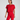 Woman wearing a red outfit on a plain background