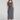 WOMAN WEARING A GRAY SPANX SLEEVELESS MAXI DRESS