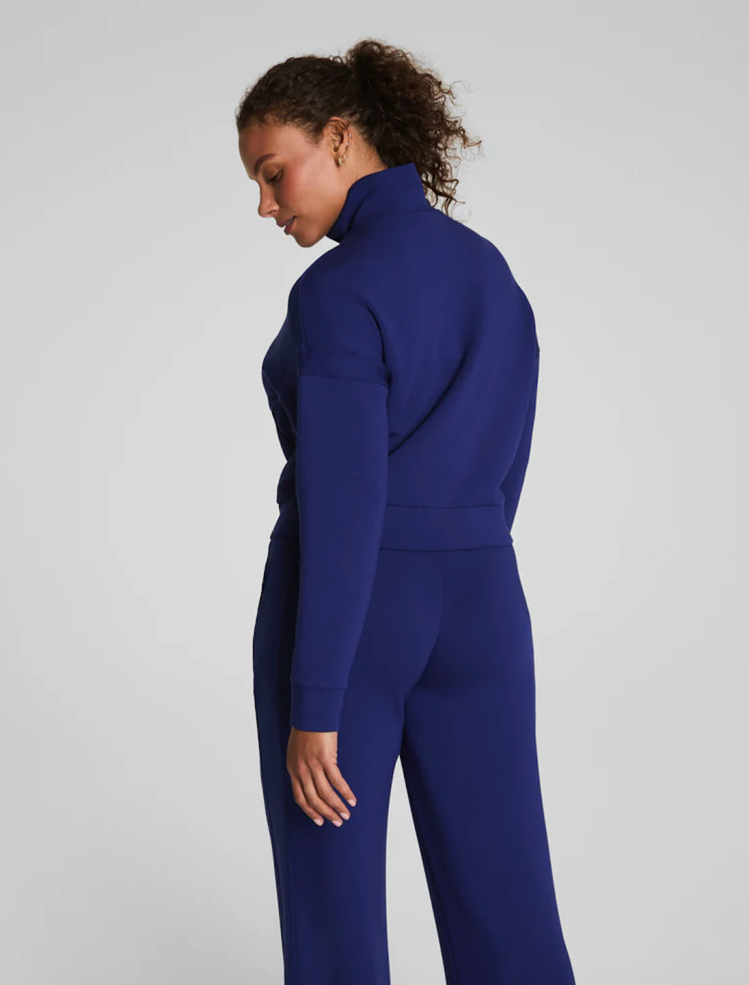 SPANX TRACK JACKET IN MIDNIGHT IRIS