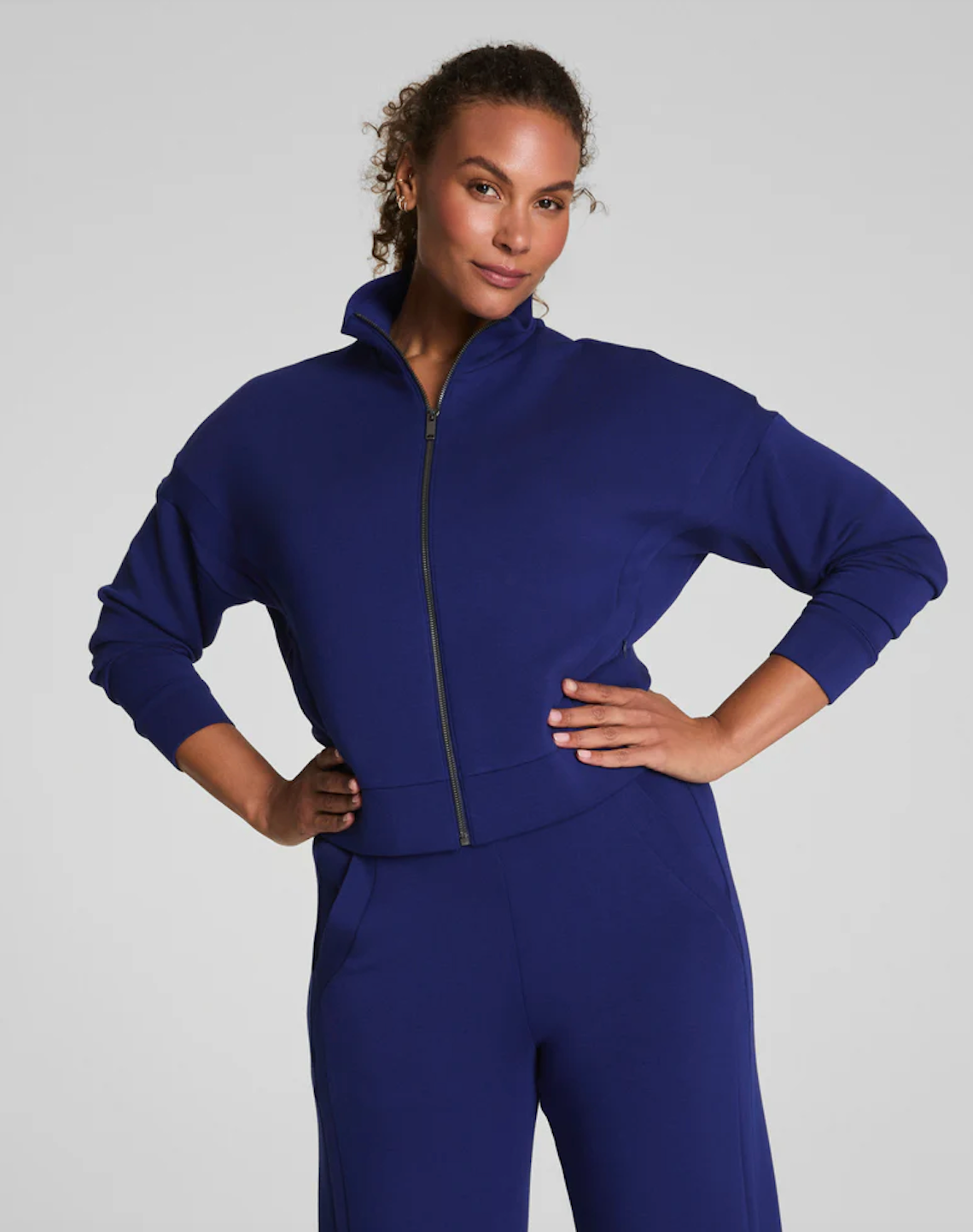 SPANX TRACK JACKET IN MIDNIGHT IRIS