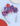 Red, white, and blue headband with star decorations on a light blue background