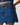 Close-up of a blue denim skirt with floral patterns on a plain background