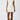 Woman wearing a white dress and brown boots on a white background