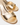 Gold metallic open-toe slide sandals with a low block heel, shown on a light gray background.