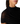 Close-up of a model wearing a black draped mock-neck top with sheer mesh shoulder panels, against a plain white background.