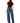 A model shown from the back wearing a dark burgundy ruched short-sleeve crop top and wide-leg blue denim jeans, set against a plain white background.