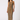 Woman wearing a patterned dress on a white background