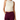 A woman wearing a sleeveless cream-colored draped mock-neck top paired with dark purple cargo pants, shown against a plain white background.