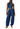 Woman wearing a blue striped jumpsuit on a white background