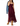 A woman models a burgundy lace spaghetti-strap midi dress with a high-low hem, styled with a blue denim jacket draped over her arm and tan ankle boots, set against a plain white background.