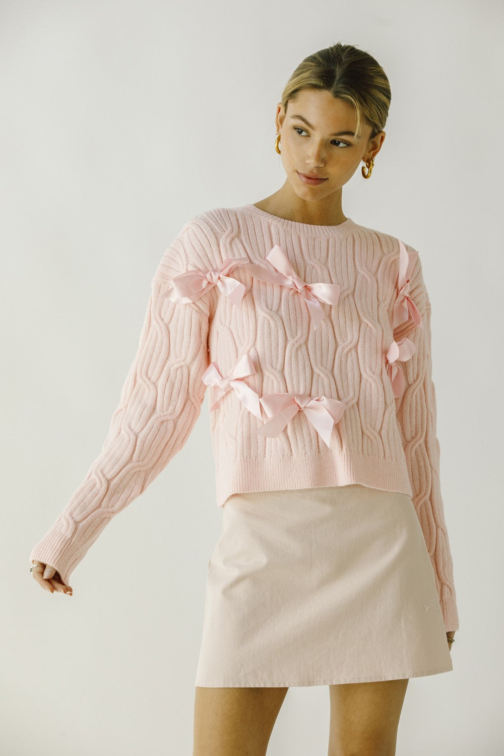 STASSIE MONOCHROMATIC BOW CABLE KNIT SWEATER IN BABY PINK