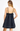 Black dress with thin straps on a white background