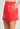 Red skirt with white floral embroidery on a plain background