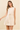 SLEEVELESS PLEATED MINI DRESS IN CREAM