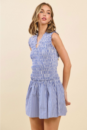 STRIPED V-NECK SMOCKED MINI DRESS IN BLUE