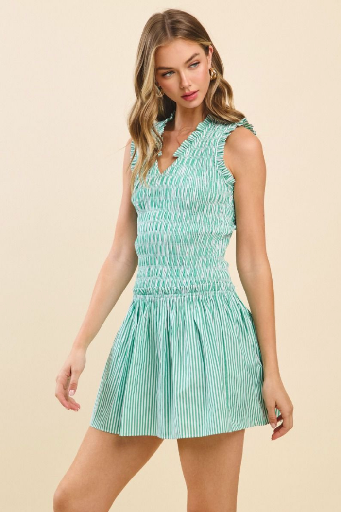 STRIPED V-NECK SMOCKED MINI DRESS IN GREEN