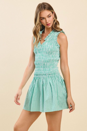 STRIPED V-NECK SMOCKED MINI DRESS IN GREEN