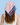 Person wearing a headscarf with red stars and 'USA' text on a blue background
