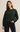 A Woman wearing a crewneck sweatshirt with long sleeves in garland green.