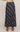 A navy blue plaid midi skirt with white and gray stripes, shown on a model from the back against a light gray studio background.