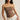 Woman wearing a brown strapless top and white shorts on a beige background