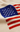 Close-up of a knitted fabric with an American flag pattern on a beige background