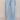 Person wearing light blue wide-leg jeans on a beige background