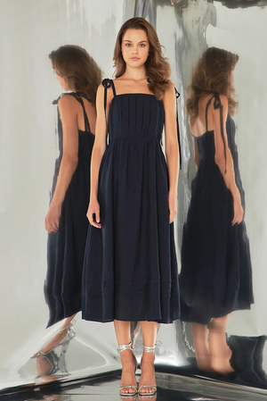 ENDLESS ROSE PLEATED MIDI DRESS IN NAVY