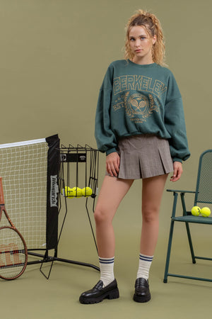 KALEY TENNIS CLUB EMBROIDERED LONG SLEEVE KNIT TOP IN HUNTER GREEN