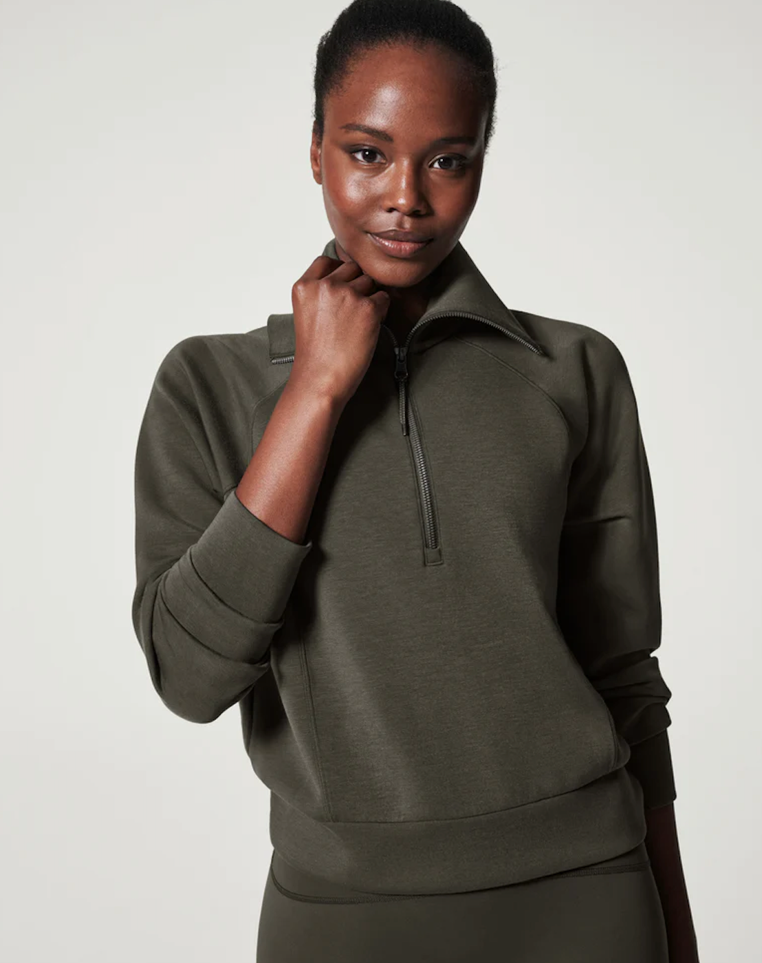 SPANX AIR ESSENTIALS HALF ZIP IN DARK PALM