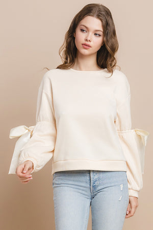 BLAIR BOW DETAIL SWEATSHIRT IN CREAM