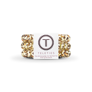 TELETIES - SMALL  - LEOPARD - You can throw all your other hair ties away because these are the ultimate replacement to the traditional hair tie! It is like a hair tie and bracelet in one! Not only are they water-resistant, reduce damage to your hair, have a strong grip, and decrease creases, they also look good on your wrist! 