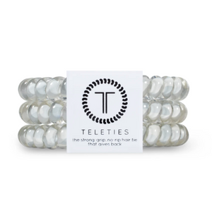 TELETIES - SMALL  - You can throw all your other hair ties away because these are the ultimate replacement to the traditional hair tie! It is like a hair tie and bracelet in one! Not only are they water-resistant, reduce damage to your hair, have a strong grip, and decrease creases, they also look good on your wrist! 