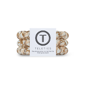  TELETIES - LARGE - TALK TO THE SAND -You can throw all your other hair ties away because these are the ultimate replacement to the traditional hair tie! It is like a hair tie and bracelet in one! Not only are they water-resistant, reduce damage to your hair, have a strong grip, and decrease creases, they also look good on your wrist! 